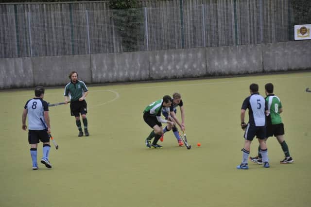 Andrew Orr in the thick of the action during South Saxons' 8-1 win at home to St Francis on Saturday. Picture by Simon Newstead