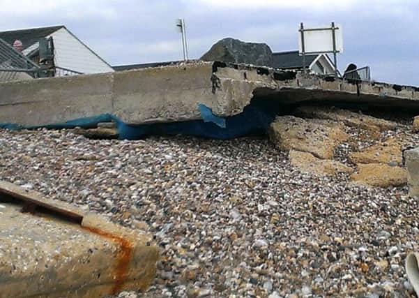 Tidal erosion has wrecked the former seating area in front of Pagham Yacht Club