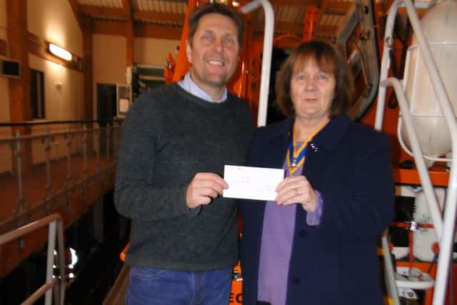 President Liz Box presents a Â£1,000 cheque to Shoreham RNLI coxswain Steve Smith