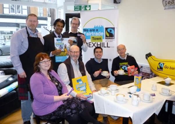 Bexhill and Battle MP Huw Merriman joins members of Bexhill Fairtrade committee at Pebble cafe, Bexhill SUS-160203-140909001