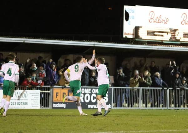 Players and fans celebrate the winning goal agaiust Sutton / Picture by Tim Hale