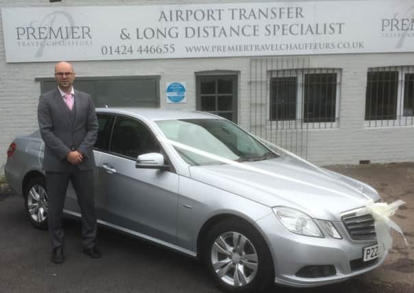Rob Magri, who has put up the cash prize for breaking the Hastings Half Marathon course records, outside Premier Travel Chauffeurs