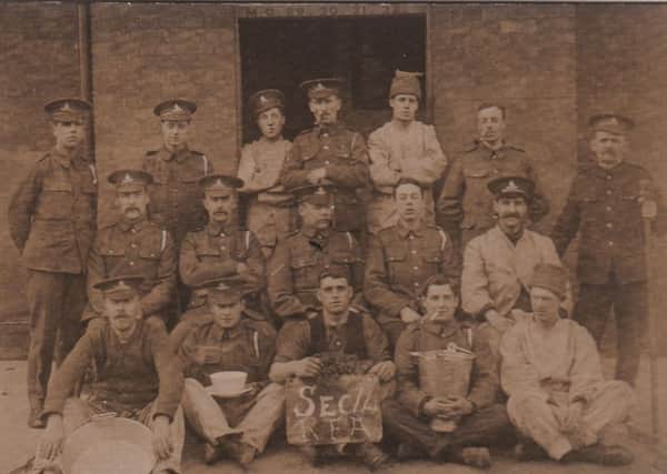 102608 Sergeant Henry Scutt, Royal Artillery, is pictured in the centre of the middle row