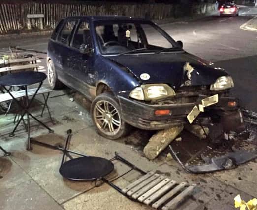 The car hit the bollards outside The Park Tavern Wednesday night after 9pm. SUS-160226-111456001