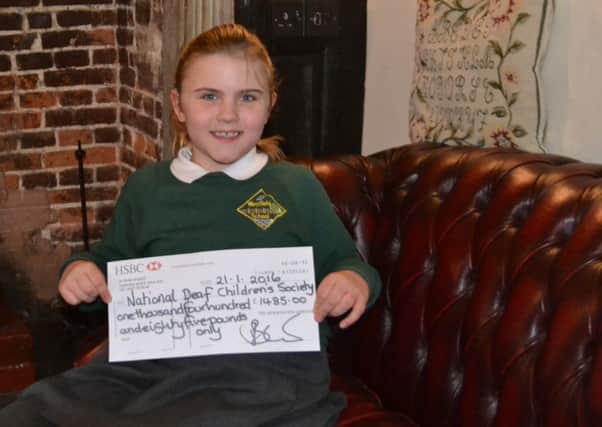 Elizabeth Kite with the cheque donated by the Mermaid Inn SUS-160226-125915001