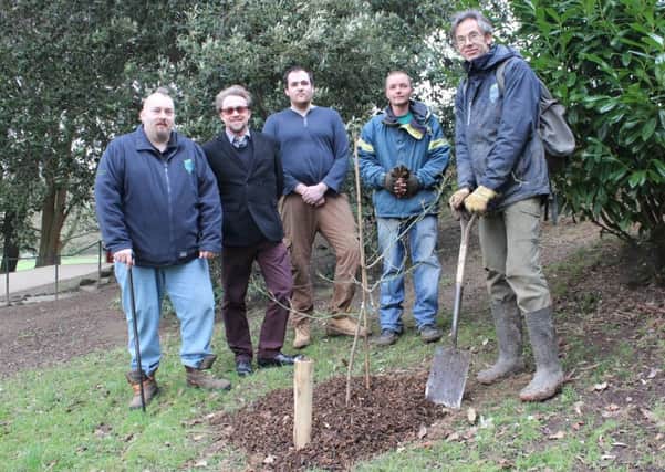 (L-R) The Conservation Volunteers' Tim Hills, lead member for environment Warren Davies, volunteers and Dr Owen Johnson