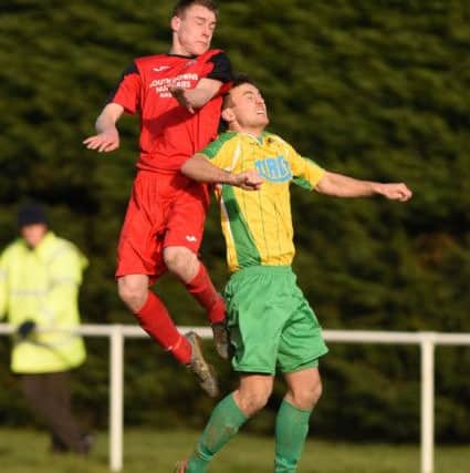 Action from Hailsham Town's 4-4 draw with Hassocks. Picture by Phil Westlake