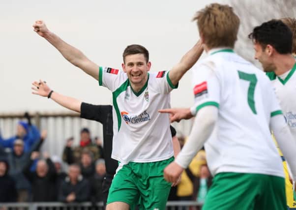 James Crane celebrates a 'goal' against Torquay - before it was disallowed / Picture by Tim Hale