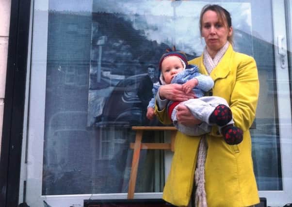 Sandra Louisa with Zachary outside her Bognor Regis studio and gallery