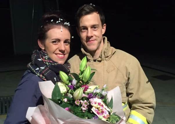 Sarah Baldwin and Kieran Hatchard celebrate their engagement at Billingshurst Fire Station