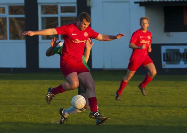 Dave Storey was on target for Bosham / Picture by Tommy McMillan