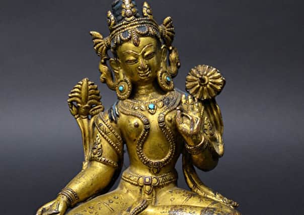 The Tibetan statue bought for Â£25 at a car boot sale ... and sold for Â£15,000 at auction SUS-160103-130155001
