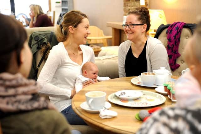 Mum Alexis Ozmen (right) has set up The Nest support group to help breast-feeding mums as a result of the help she received from midwife Carolyn Hay. Pic Steve Robards SR1607207 SUS-160103-130536001