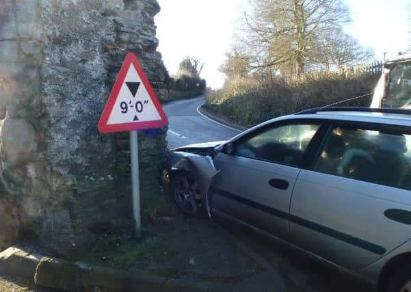 A car crashed into the Pipewell or Ferry Gate on the A259 at the top of Ferry Hill, Winchelsea, on Friday, February 19. Photo courtesy of Richard Comotto