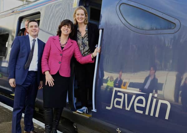 Huw Merriman MP, former transport minister Claire Perry, Amber Rudd MP at last year's summit with a high-speed Javelin train SUS-150511-075751001