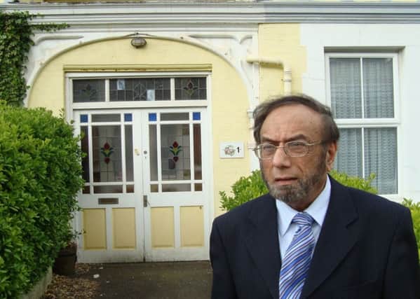 Mo Khan outside the Bexhill Islamic Association's headquarters in 2010
