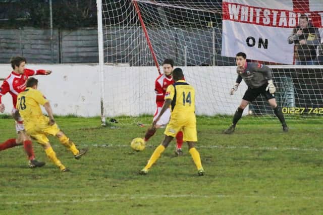 Sam Adams scores for Hastings United in the reverse fixture against Whitstable Town. Picture courtesy Joe Knight