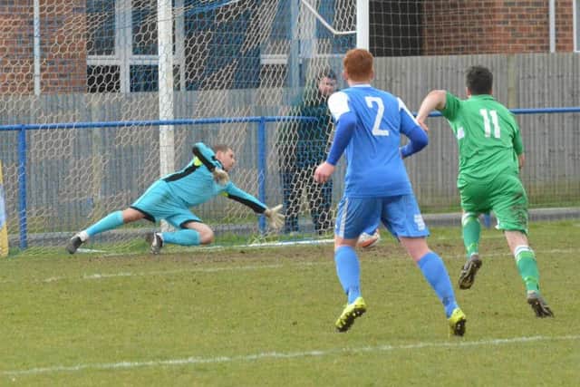 Simon Lehkyj's important penalty save. Picture by Grahame Lehkyj