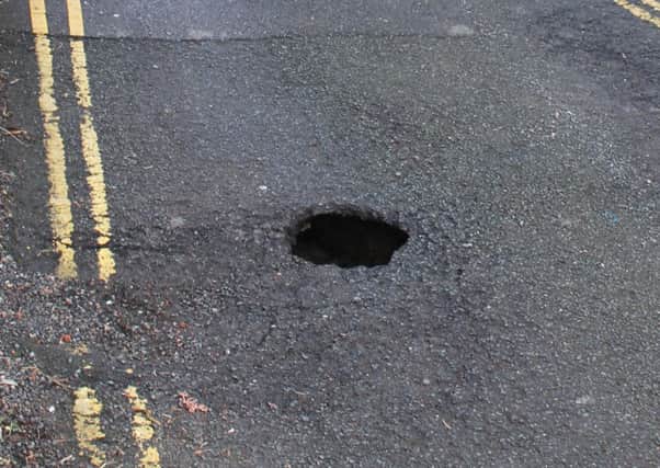 The sink hole appeared in Hastings Old Town outside St Clements Church. SUS-160603-090459001