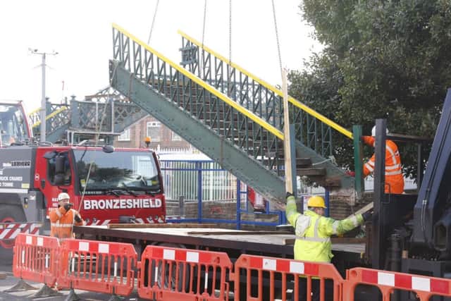 The footbridge being removed from Lancing station. Picture by Eddie Mitchell SUS-160603-103826001