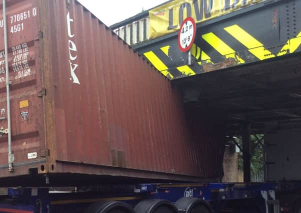 A lorry stuck under a bridge in Tulse Hill in Septemebr 2015. Image supplied by Network Rail SUS-160603-143007001