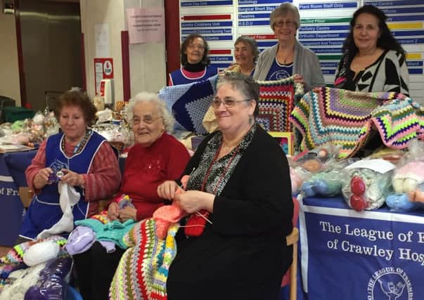 Maria Hains and the Crawley Hospital League of Friends knitters in the front hall of Crawley Hospital. Front row (L-R) Maria Hains, Gwen Pearson, and Lynda Appleby; back row L-R are Maria's good as new stall helpers Wyn Ebanks, Margaret Ellis, Hilary Parsons and Rosalind Phipps - picture submitted