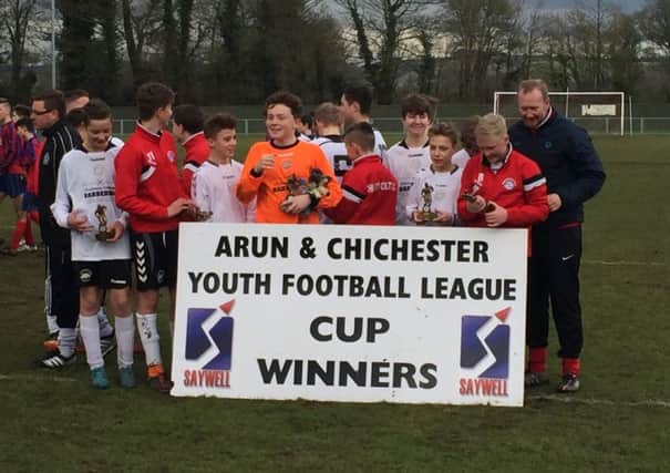 Chi City Colts under-14s with their cup