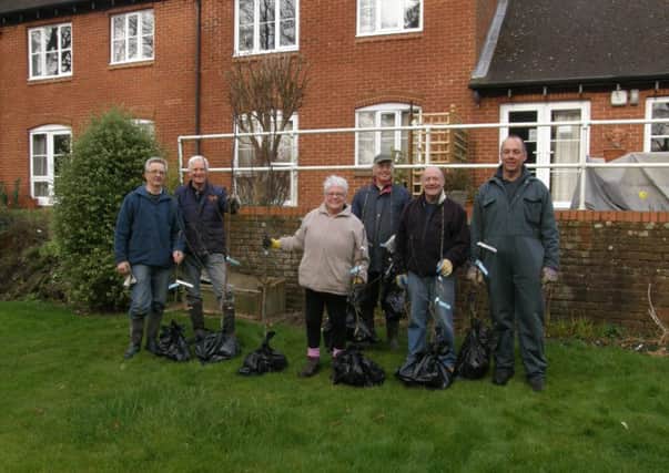 Volunteers from Steyning Community Orchard planting trees at Primrose Court