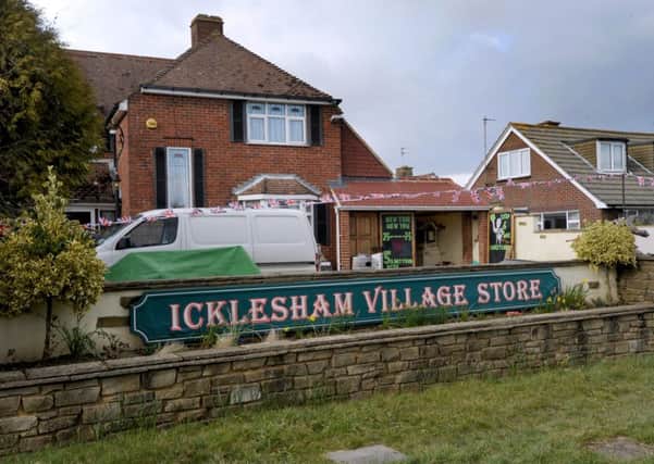 Icklesham Village Store. SUS-160803-071353001