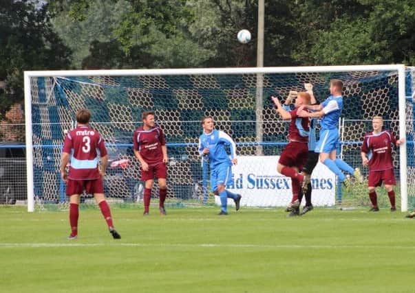 Action from the FA Vase tie between Haywards Heath Town and Little Common back in September. Picture courtesy Stuart Morgan