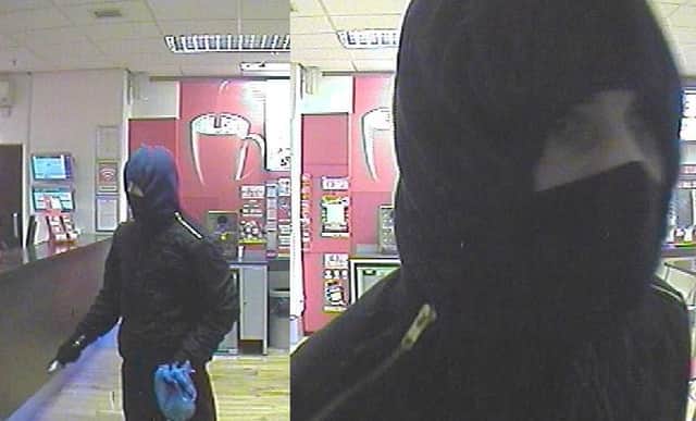 Masked man who robbed the Ladbrokes betting shop in Langney SUS-160903-145554001