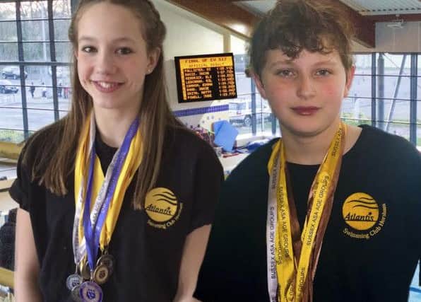 Atlantis Swimming Club's Becs Barber and Michael Pallister top the medal hauls for both girls and boys