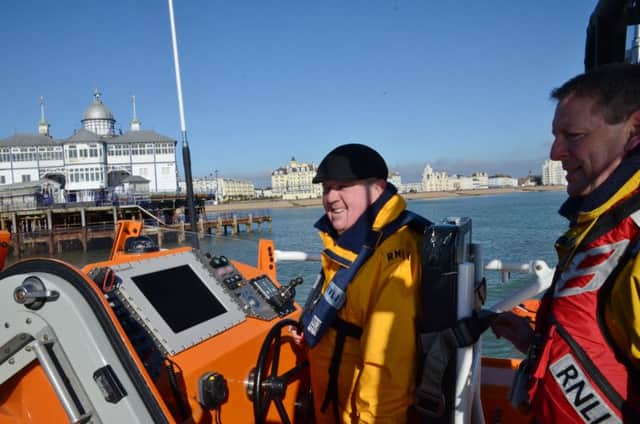 Paul Metcalfe at the helm of Eastbourne's Diamond Jubilee lifeboat on Sunday morning SUS-161003-115540001