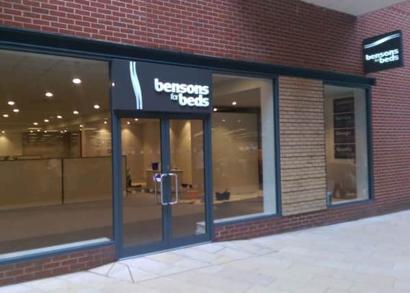 Signs go up for Bensons for Beds in The Forum, Horsham.