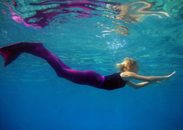 Children learn how to swim like a mermaid. Photo courtesy of Sarah Jaban