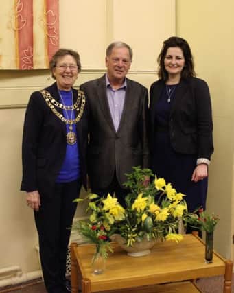 Mayor of Eastbourne Janet Coles, the night shelter's David Barratt and MP Caroline Ansell SUS-160316-142011001