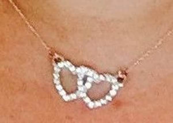 Photo of necklace stolen in Horsham burgalry. Photo by Sussex Police
