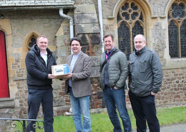 (L-R) Ed Clarke, Rev Paul Parks, Cllr Andy Batsford and John Whittington with the new CCTV camera outside St Helens Church