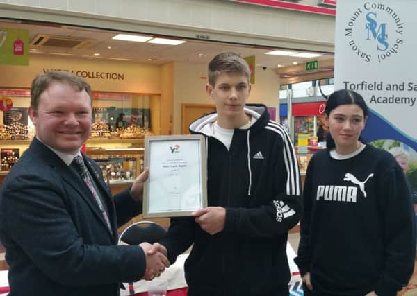 Torfield School and Saxon Mount School students came joint-first at the trade fair and Brett McLean presented the award