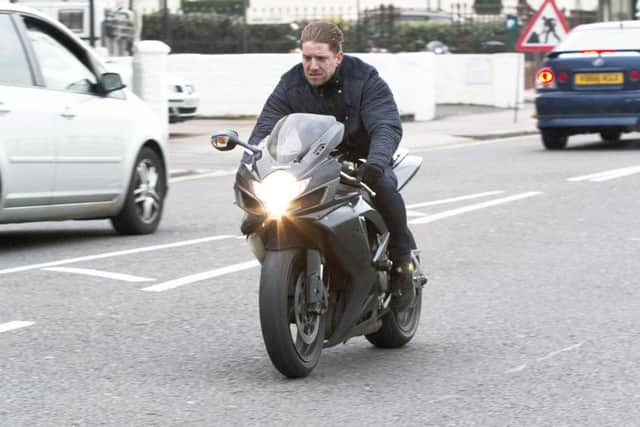 Sussex Police hope the motocyclist will be identified through the pictures Photo: Hugo Michaels