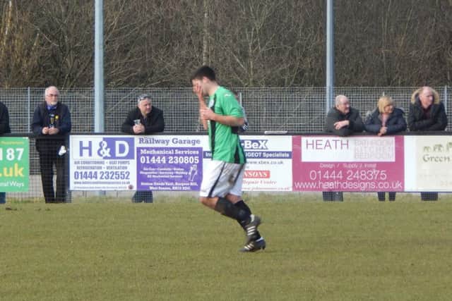 Andy Pearson walks off after being shown red for Burgess Hill Town v Hampton and Richmond.