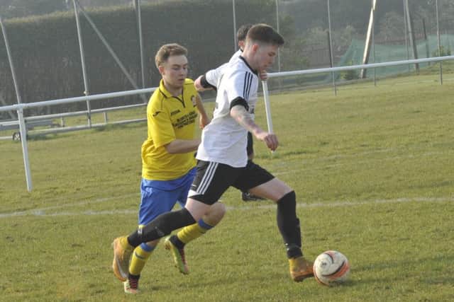 Corey Wheeler, who set up both of Bexhill United's goals, on the ball against Saltdean United (SUS-161203-221436002)