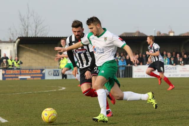 Ollie Pearce attacks against Grimsby / Picture by Tim Hale