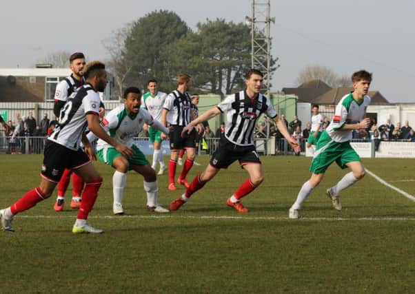 Chike Kandi and Doug Tuck in action in the first leg versus Grimsby / Picture by Tim Hale