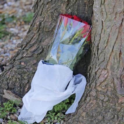 Flowers left at the scene where a teen was stabbed Photo: Eddie Mitchell