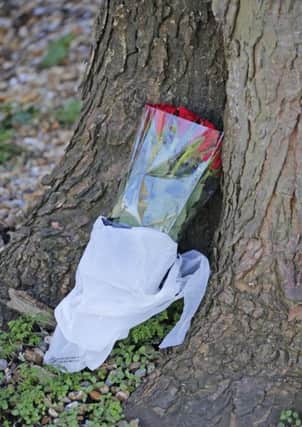 Flowers left at the scene where a teen was stabbed Photo: Eddie Mitchell