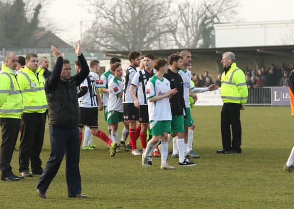 Rocks boss Jamie Howell and his players applaud the fans on Saturday