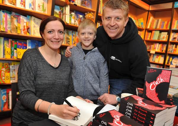 Crawley author Eve Ainsworth held a book signing event for her second young adult novel called Crush. Here with David Surridge and son Tommy. Pic Steve Robards SR1608009 SUS-160314-120918001