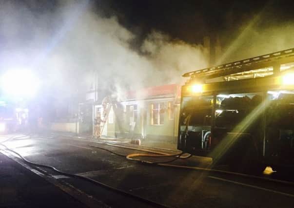 Smoke coming from Cafe Martini on Friday night. Photo by Moe Lewis