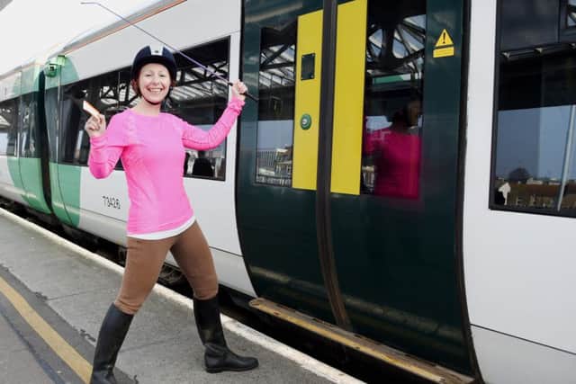 Horse rider Angela Gallen prepares to board a train for a South Downs National Park adventure. Picture by Simon Dack
